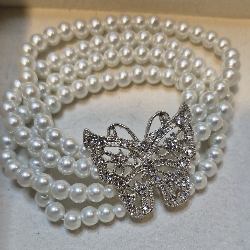 Elegant White Pearl Stretch Bracelet with Silver Butterfly Charm